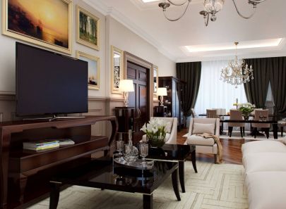 Сочетание черного, коричневого и бежевого цветов в интерьере гостиной