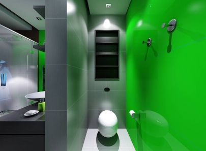 Интерьер туалетной комнаты с яркой зеленой стеной