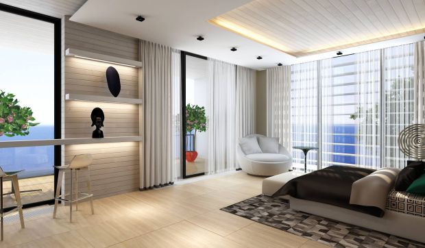 Интерьер спальни с видом на море