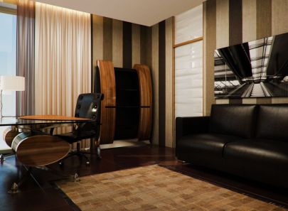 Рабочий кабинет в коричневой гамме с черной мягкой мебелью