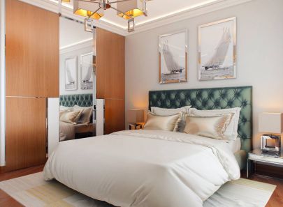 Темно-зеленая кровать в светлом интерьере спальни