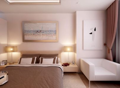 Дизайн спальни в естественных оттенках с белым шезлонгом