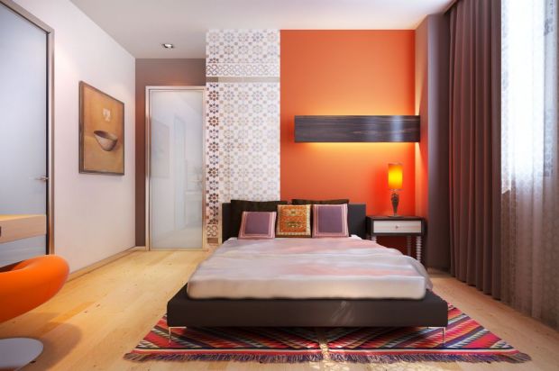 Оранжевые стены и мебель в спальне