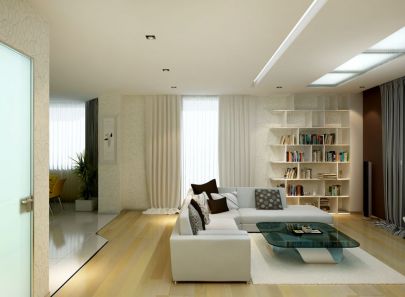 Интерьер светлой гостиной с белым диваном и столиком из темного стекла